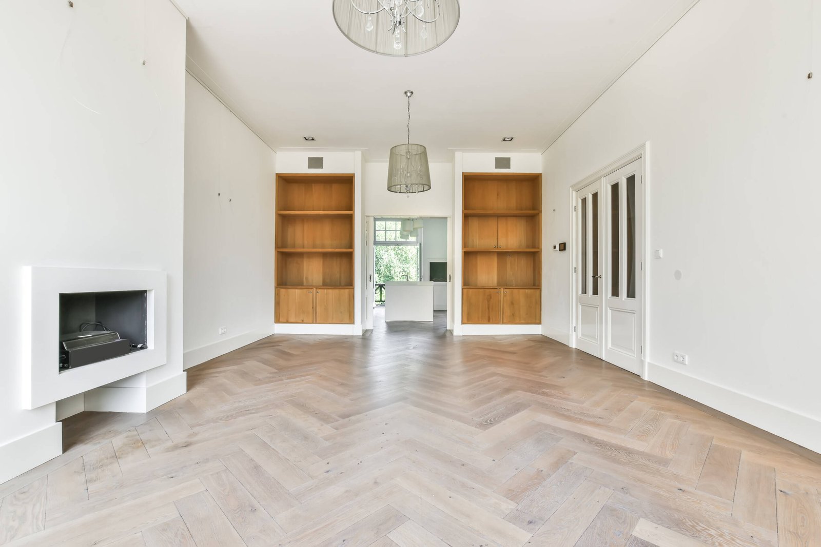 luxury spacious room with wooden style shelves and cabinets