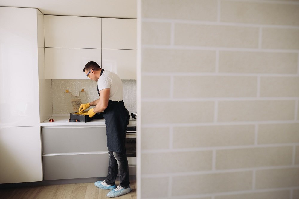 maintenance-man-looking-for-instruments-to-install-2025-02-21-12-14-34-utc